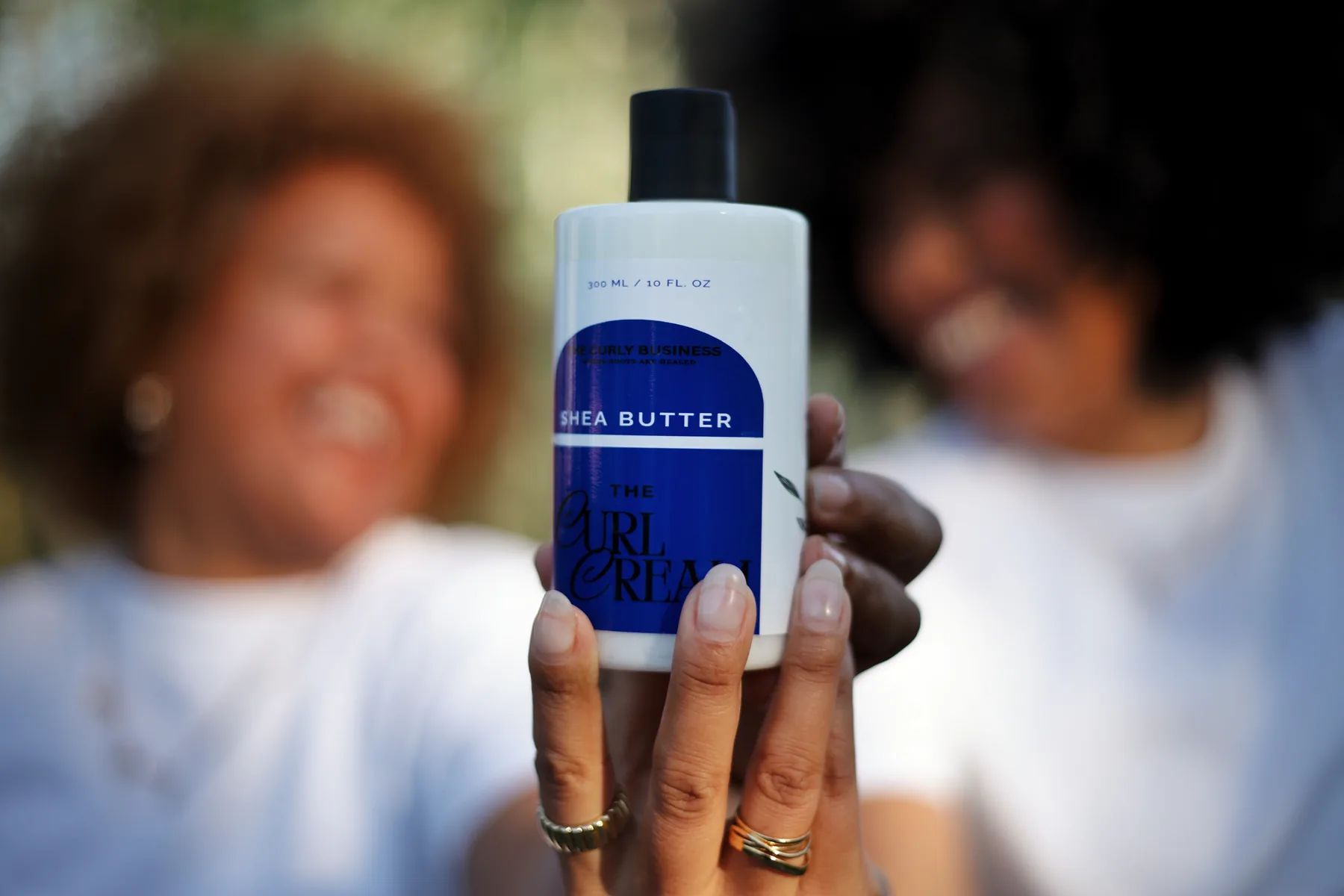 Natural hair portrait with The Curly Business products
